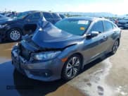 ✅ 2018 Honda Civic EX-T • VIN: JHMFC1F35JX042390 • Lot: 43767703. Listed on IAAI with 73,601 mi. Free auction sales archive from the USA and detailed vehicle history report at DreamBid. Image 2.