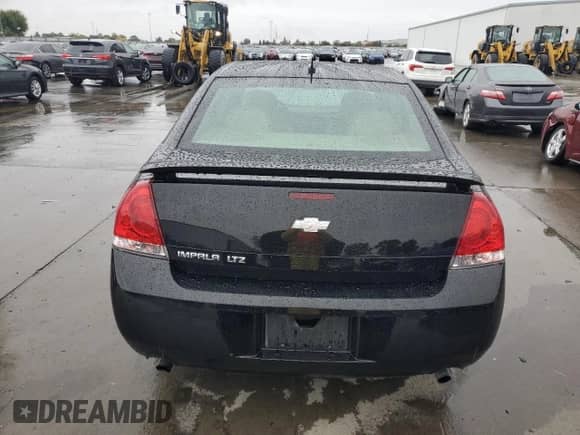 ✅ 2013 Chevrolet Impala LTZ • VIN: 2G1WC5E36D1259984 • Lot: 86337875. Wystawiony na Copart z przebiegiem 262 439 mil. Bezpłatny archiwum sprzedaży aukcyjnych z USA i szczegółowy raport historii pojazdu na DreamBid. Zdjęcie 6.