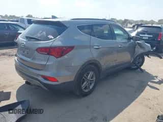 2018 Hyundai Santa Fe 2.4L z VIN 5NMZUDLB1JH065408, wystawiony jako IAAI lot #43342396 z przebiegiem 113 154 mil mil oraz . Historia ofert i sprzedaży dostępna na DreamBid. Obrazek 4.