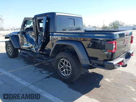 ✅ 2024 Jeep Gladiator Rubicon • VIN: 1C6JJTBG3RL126739 • Lot: 43566714. Listed on IAAI with 6,549 mi. Free auction sales archive from the USA and detailed vehicle history report at DreamBid. Image 3.