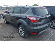 ✅ 2017 Ford Escape Titanium • VIN: 1FMCU0JD9HUE03672 • Lot: 42411549. Wystawiony na IAAI z przebiegiem 89 846 mil. Bezpłatny archiwum sprzedaży aukcyjnych z USA i szczegółowy raport historii pojazdu na DreamBid. Zdjęcie 3.