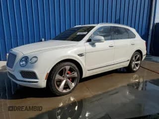 ✅ 2017 Bentley Bentayga W12 • VIN: SJAAC2ZV6HC015698 • Lot: 44499271. Wystawiony na Copart z przebiegiem 35 124 mil. Bezpłatny archiwum sprzedaży aukcyjnych z USA i szczegółowy raport historii pojazdu na DreamBid. Zdjęcie 1.
