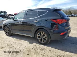 ✅ 2017 Hyundai Santa Fe Ultimate • VIN: 5XYZWDLA7HG421611 • Лот: 43255154. Опубликован ранее на Copart с пробегом 86 445 миль. Бесплатный доступ к архиву аукционных продаж из США и подробный отчёт об истории автомобиля на DreamBid. Изображение 2.