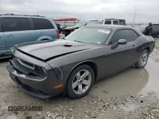 ✅ 2013 Dodge Challenger SXT • VIN: 2C3CDYAG8DH582284 • Lot: 86512224. Wystawiony na Copart z przebiegiem 137 808 mil. Bezpłatny archiwum sprzedaży aukcyjnych z USA i szczegółowy raport historii pojazdu na DreamBid. Zdjęcie 1.