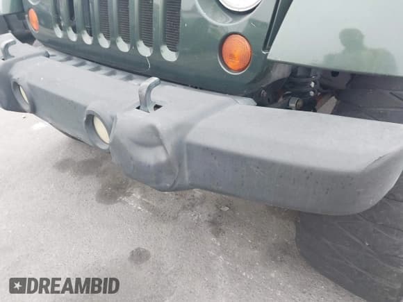 ✅ 2007 Jeep Wrangler Unlimited Sahara • VIN: 1J4GA59147L218594 • Lot: 42984397. Listed on IAAI with 108,296 mi. Free auction sales archive from the USA and detailed vehicle history report at DreamBid. Image 18.