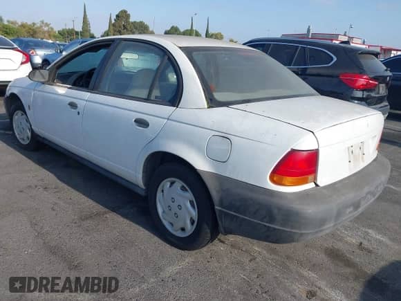 1998 Saturn SL z VIN 1G8ZF5284WZ303478, wystawiony jako IAAI lot #42946026 z przebiegiem 175 786 mil mil oraz . Historia ofert i sprzedaży dostępna na DreamBid. Obrazek 3.