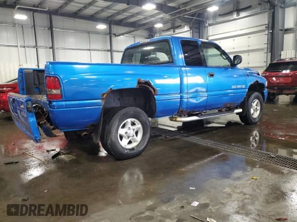 2001 Dodge 1500 with VIN 3B7HF13Z11G171774, listed as a Copart auction lot 74521024 with 156,702 mi miles and Salvage title. Bid and sale history available at DreamBid. Image 3.