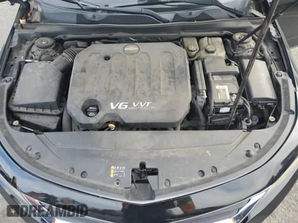 2017 Chevrolet Impala LT z VIN 2G1105S33H9118224, wystawiony jako Copart lot #89814575 z przebiegiem 99 760 mil mil oraz Szkoda całkowita • Salvage title. Historia ofert i sprzedaży dostępna na DreamBid. Obrazek 11.