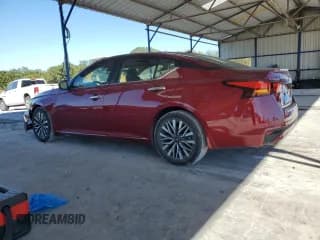 ✅ 2023 Nissan Altima SV • VIN: 1N4BL4DV0PN322945 • Лот: 86900785. Опубликован ранее на Copart с пробегом 101 490 миль. Бесплатный доступ к архиву аукционных продаж из США и подробный отчёт об истории автомобиля на DreamBid. Изображение 2.