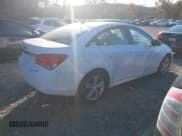 ✅ 2014 Chevrolet Cruze 2LT • VIN: 1G1PE5SB0E7418528 • Lot: 43525230. Listed on IAAI with 89,999 mi. Free auction sales archive from the USA and detailed vehicle history report at DreamBid. Image 4.