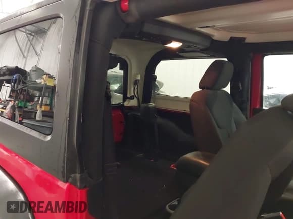 ✅ 2016 Jeep Wrangler Willys Wheeler • VIN: 1C4AJWAG4GL141467 • Lot: 43513365. Listed on IAAI with 85,653 mi. Free auction sales archive from the USA and detailed vehicle history report at DreamBid. Image 8.