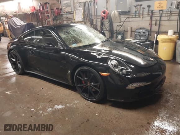 ✅ 2015 Porsche 911 Carrera S • VIN: WP0AB2A96FS125928 • Lot: 43813644. Listed on IAAI with 13,850 mi. Free auction sales archive from the USA and detailed vehicle history report at DreamBid. Image 1.