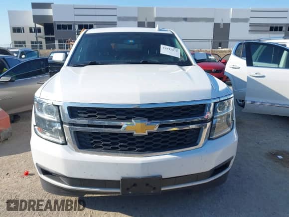 2018 Chevrolet Suburban LS z VIN 1GNSKGKC1JR137052, wystawiony jako IAAI lot #42942872 z przebiegiem 150 898 mil mil oraz . Historia ofert i sprzedaży dostępna na DreamBid. Obrazek 12.