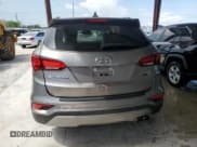 ✅ 2017 Hyundai Santa Fe Ultimate • VIN: 5XYZWDLA4HG489199 • Лот: 63521243. Опубликован ранее на Copart с пробегом 97 055 миль. Бесплатный доступ к архиву аукционных продаж из США и подробный отчёт об истории автомобиля на DreamBid. Изображение 6.