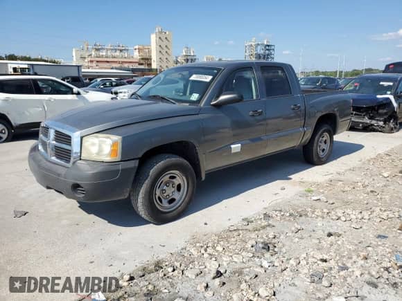 2006 Dodge Dakota ST z VIN 1D7HE28K36S522601, wystawiony jako Copart lot #73888054 z przebiegiem 149 142 mil mil oraz Szkoda całkowita • Salvage title. Historia ofert i sprzedaży dostępna na DreamBid. Obrazek 1.