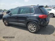 ✅ 2013 Volkswagen Tiguan SE • VIN: WVGBV7AX3DW535952 • Lot: 60476265. Listed on Copart with 126,204 mi. Free auction sales archive from the USA and detailed vehicle history report at DreamBid. Image 2.