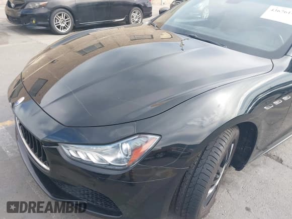 ✅ 2014 Maserati Ghibli • VIN: ZAM57XSA8E1106208 • Lot: 43676142. Wystawiony na IAAI z przebiegiem 53 256 mil. Bezpłatny archiwum sprzedaży aukcyjnych z USA i szczegółowy raport historii pojazdu na DreamBid. Zdjęcie 6.
