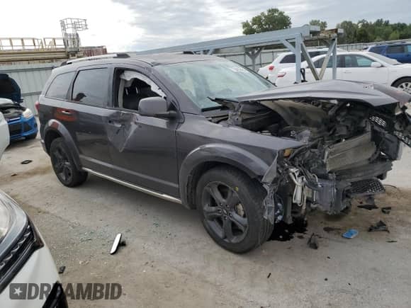 2018 Dodge Journey Crossroad with VIN 3C4PDCGG4JT379273, listed as a Copart auction lot 70452495 with 122,550 mi miles and Salvage title. Bid and sale history available at DreamBid. Image 4.