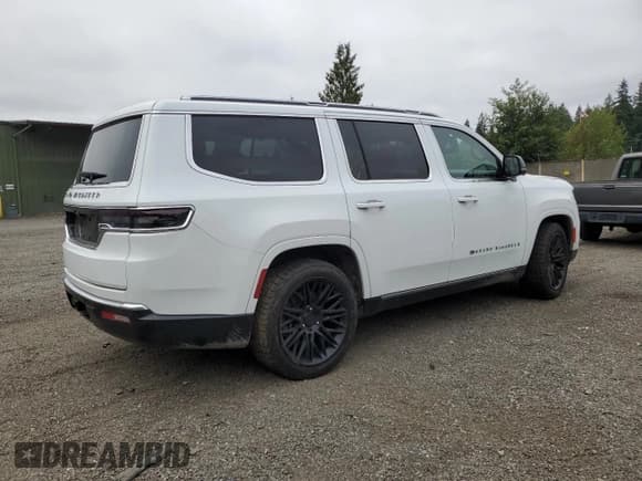 ✅ 2023 Jeep Grand Wagoneer • VIN: 1C4SJVEJ1PS560841 • Lot: 61099385. Listed on Copart with 15,467 mi. Free auction sales archive from the USA and detailed vehicle history report at DreamBid. Image 3.