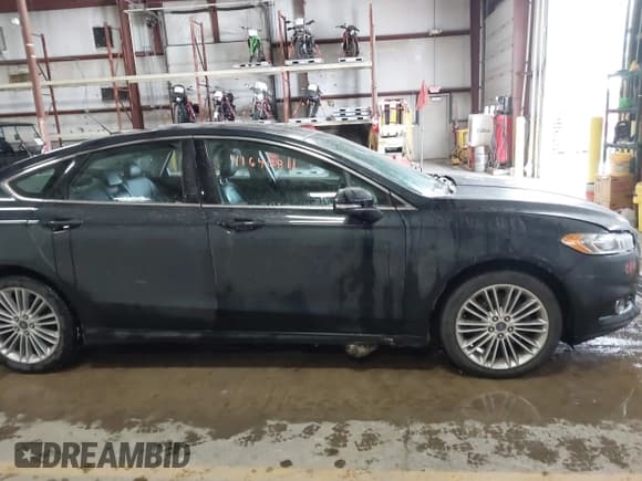 ✅ 2014 Ford Fusion SE • VIN: 3FA6P0T9XER248771 • Лот: 41640811. Опубликован ранее на IAAI с пробегом 113 981 миль. Бесплатный доступ к архиву аукционных продаж из США и подробный отчёт об истории автомобиля на DreamBid. Изображение 14.