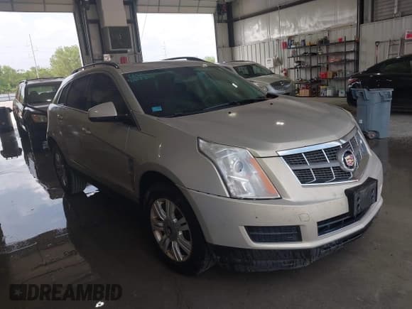 ✅ 2012 Cadillac SRX • VIN: 3GYFNGE38CS572089 • Лот: 42283415. Опубликован ранее на IAAI с пробегом 188 060 миль. Бесплатный доступ к архиву аукционных продаж из США и подробный отчёт об истории автомобиля на DreamBid. Изображение 1.
