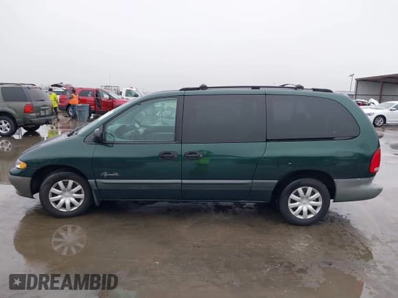 ✅ 1997 Plymouth Grand Voyager • VIN: 2P4GP44R5VR377345 • Lot: 41435749. Wystawiony na IAAI z przebiegiem 191 298 mil. Bezpłatny archiwum sprzedaży aukcyjnych z USA i szczegółowy raport historii pojazdu na DreamBid. Zdjęcie 14.