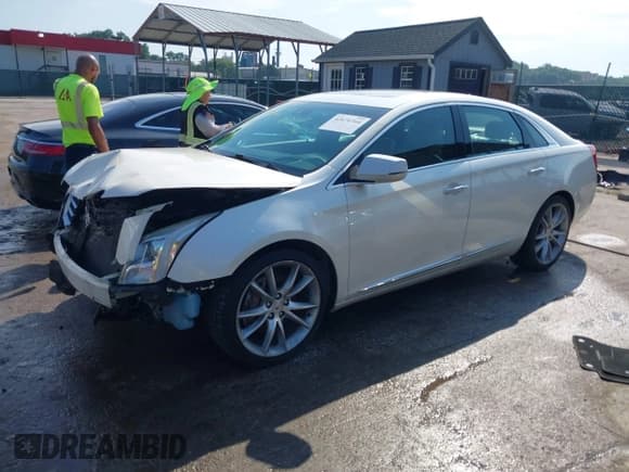 ✅ 2013 Cadillac XTS Premium • VIN: 2G61T5S39D9195949 • Лот: 42674764. Опубликован ранее на IAAI с пробегом 158 082 миль. Бесплатный доступ к архиву аукционных продаж из США и подробный отчёт об истории автомобиля на DreamBid. Изображение 2.