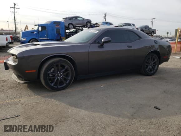✅ 2022 Dodge Challenger SXT • VIN: 2C3CDZGGXNH156756 • Lot: 78915354. Wystawiony na Copart z przebiegiem 43 704 mil. Bezpłatny archiwum sprzedaży aukcyjnych z USA i szczegółowy raport historii pojazdu na DreamBid. Zdjęcie 1.
