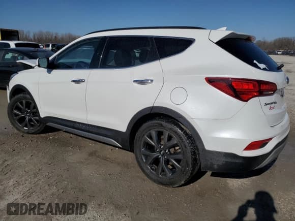 ✅ 2018 Hyundai Santa Fe Ultimate • VIN: 5XYZWDLA7JG566945 • Лот: 45145774. Опубликован ранее на Copart с пробегом 97 758 миль. Бесплатный доступ к архиву аукционных продаж из США и подробный отчёт об истории автомобиля на DreamBid. Изображение 2.