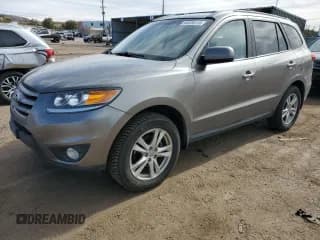 ✅ 2012 Hyundai Santa Fe Limited • VIN: 5XYZK3AB5CG093437 • Lot: 90826015. Listed on Copart with 108,893 mi. Free auction sales archive from the USA and detailed vehicle history report at DreamBid. Image 1.