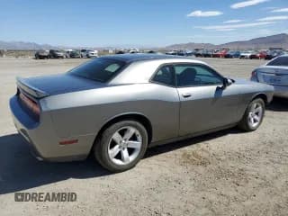 ✅ 2012 Dodge Challenger SXT • VIN: 2C3CDYAG2CH268340 • Lot: 68305604. Wystawiony na Copart z przebiegiem 183 818 mil. Bezpłatny archiwum sprzedaży aukcyjnych z USA i szczegółowy raport historii pojazdu na DreamBid. Zdjęcie 3.