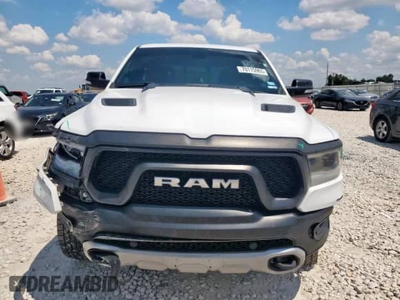 2020 Ram 1500 Rebel z VIN 1C6SRFLM5LN364977, wystawiony jako Copart lot #70115965 z przebiegiem 96 631 mil mil oraz Szkoda całkowita • Salvage title. Historia ofert i sprzedaży dostępna na DreamBid. Obrazek 5.