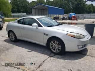 2007 Hyundai Tiburon GS с VIN KMHHM66D47U257018, выставлен на аукционе Copart как лот 64314855 с пробегом 183 370 миль миль и Списание • Salvage title. История ставок и продаж доступна на DreamBid. Изображение 4.