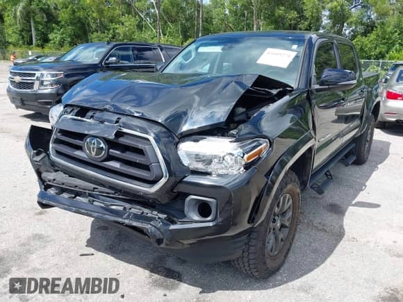 2022 Toyota Tacoma SR5 with VIN 3TMAZ5CN4NM164094, listed as a IAAI auction lot 43409274 with 38,585 mi miles and . Bid and sale history available at DreamBid. Image 6.
