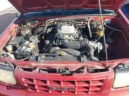 ✅ 1999 Isuzu Rodeo S • VIN: 4S2CK58W3X4307201 • Lot: 41884901. Listed on IAAI with 236,970 mi. Free auction sales archive from the USA and detailed vehicle history report at DreamBid. Image 10.