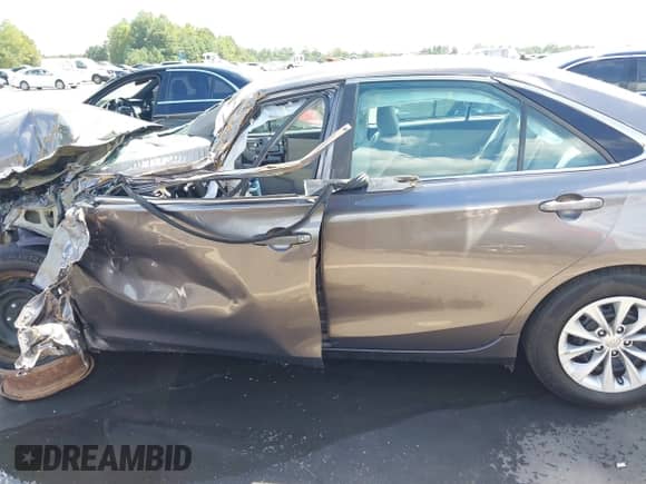 2015 Toyota Camry LE with VIN 4T4BF1FK4FR446399, listed as a IAAI auction lot 43128423 with 82,545 mi miles and . Bid and sale history available at DreamBid. Image 15.