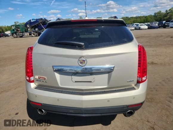 ✅ 2015 Cadillac SRX Premium Collection • VIN: 3GYFNGE38FS547147 • Lot: 70882935. Wystawiony na Copart z przebiegiem 160 153 mil. Bezpłatny archiwum sprzedaży aukcyjnych z USA i szczegółowy raport historii pojazdu na DreamBid. Zdjęcie 6.