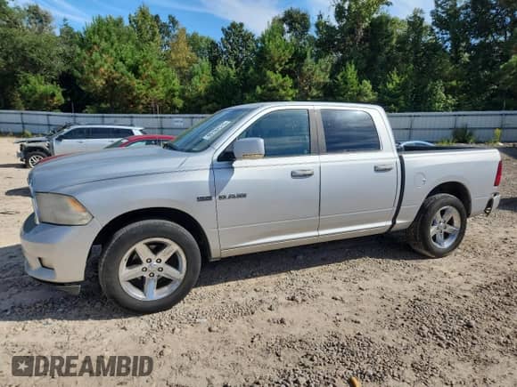 2009 Dodge 1500 Sport with VIN 1D3HB13T69S710103, listed as a Copart auction lot 80182515 with 197,933 mi miles and Salvage title. Bid and sale history available at DreamBid. Image 1.