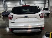 ✅ 2017 Ford Escape Titanium • VIN: 1FMCU0JD3HUD40648 • Lot: 90056455. Wystawiony na Copart z przebiegiem 69 569 mil. Bezpłatny archiwum sprzedaży aukcyjnych z USA i szczegółowy raport historii pojazdu na DreamBid. Zdjęcie 6.
