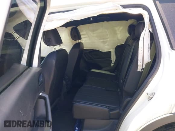 ✅ 2022 Volkswagen Tiguan SE R-Line Black • VIN: 3VVCB7AX3NM073218 • Лот: 42254388. Опубликован ранее на IAAI с пробегом 31 998 миль. Бесплатный доступ к архиву аукционных продаж из США и подробный отчёт об истории автомобиля на DreamBid. Изображение 8.