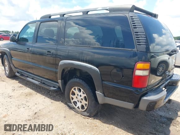 ✅ 2003 Chevrolet Suburban LS • VIN: 3GNFK16Z13G105508 • Lot: 42864551. Listed on IAAI with 294,320 mi. Free auction sales archive from the USA and detailed vehicle history report at DreamBid. Image 3.