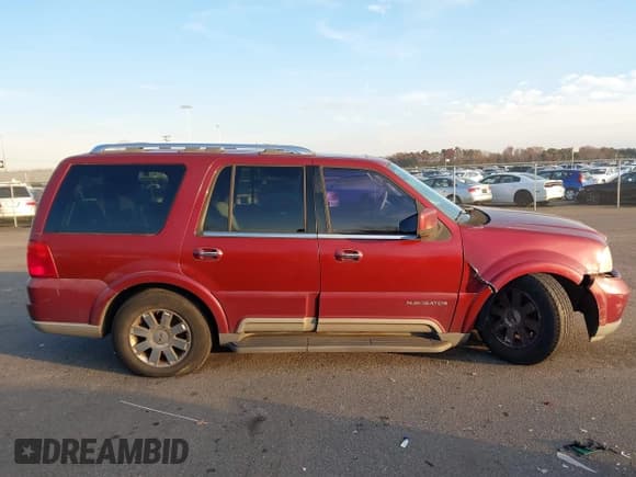 ✅ 2004 Lincoln Navigator Luxury • VIN: 5LMFU28R04LJ18771 • Lot: 43747344. Listed on IAAI with 205,752 mi. Free auction sales archive from the USA and detailed vehicle history report at DreamBid. Image 13.