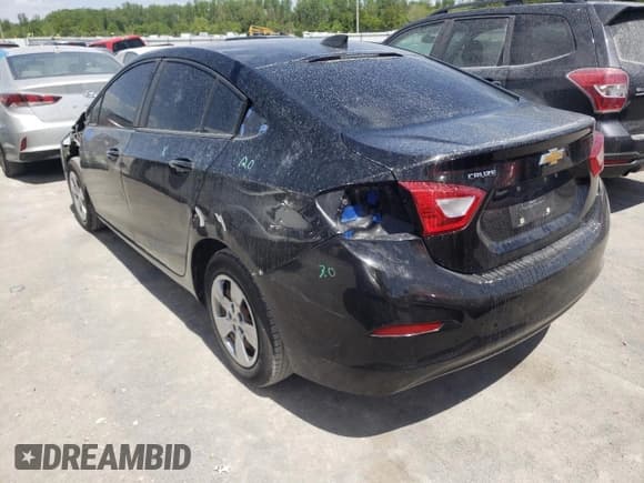✅ 2018 Chevrolet Cruze LS • VIN: 1G1BC5SM0J7148454 • Lot: 50371633. Listed on Copart with 112,015 mi. Free auction sales archive from the USA and detailed vehicle history report at DreamBid. Image 2.