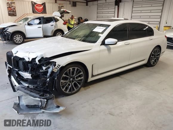 ✅ 2022 BMW 7 Series 750i xDrive • VIN: WBA7U2C02NCG79415 • Lot: 41394743. Listed on IAAI with 31,839 mi. Free auction sales archive from the USA and detailed vehicle history report at DreamBid. Image 2.