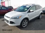 ✅ 2014 Ford Escape Titanium • VIN: 1FMCU9J96EUA14189 • Lot: 43480931. Wystawiony na IAAI z przebiegiem 147 748 mil. Bezpłatny archiwum sprzedaży aukcyjnych z USA i szczegółowy raport historii pojazdu na DreamBid. Zdjęcie 2.