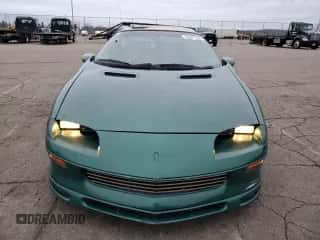 1997 Chevrolet Camaro z VIN 2G1FP32K5V2124866, wystawiony jako Copart lot #86287254 z przebiegiem 84 997 mil mil oraz Szkoda całkowita • Salvage title. Historia ofert i sprzedaży dostępna na DreamBid. Obrazek 5.