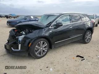 ✅ 2024 Cadillac XT5 FWD Premium Luxury • VIN: 1GYKNCR44RZ757102 • Lot: 82776845. Wystawiony na Copart z przebiegiem 21 895 mil. Bezpłatny archiwum sprzedaży aukcyjnych z USA i szczegółowy raport historii pojazdu na DreamBid. Zdjęcie 1.