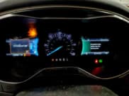 ✅ 2015 Ford Fusion SE Hybrid • VIN: 3FA6P0LU6FR214171 • Lot: 94726935. Wystawiony na Copart z przebiegiem 126 593 mil. Bezpłatny archiwum sprzedaży aukcyjnych z USA i szczegółowy raport historii pojazdu na DreamBid. Zdjęcie 9.