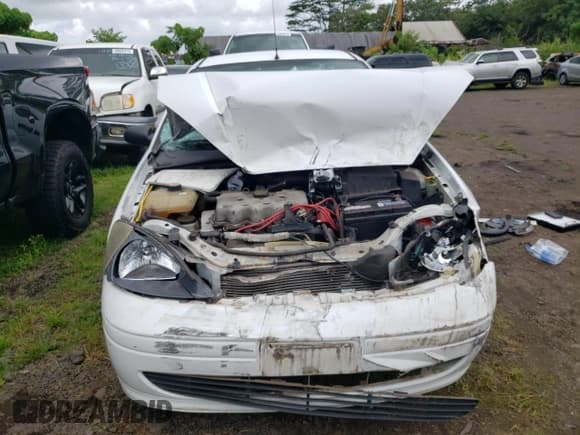 ✅ 2004 Ford Focus LX • VIN: 1FAFP33P74W164340 • Lot: 70513195. Listed on Copart with 186,485 mi. Free auction sales archive from the USA and detailed vehicle history report at DreamBid. Image 5.