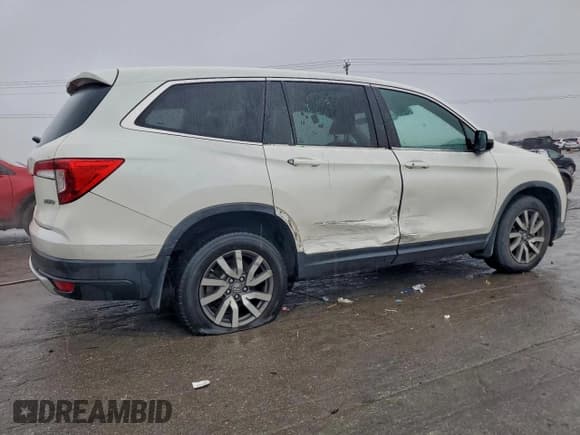 ✅ 2019 Honda Pilot EX-L • VIN: 5FNYF6H5XKB075765 • Лот: 93440515. Опубликован ранее на Copart с пробегом 96 994 миль. Бесплатный доступ к архиву аукционных продаж из США и подробный отчёт об истории автомобиля на DreamBid. Изображение 3.